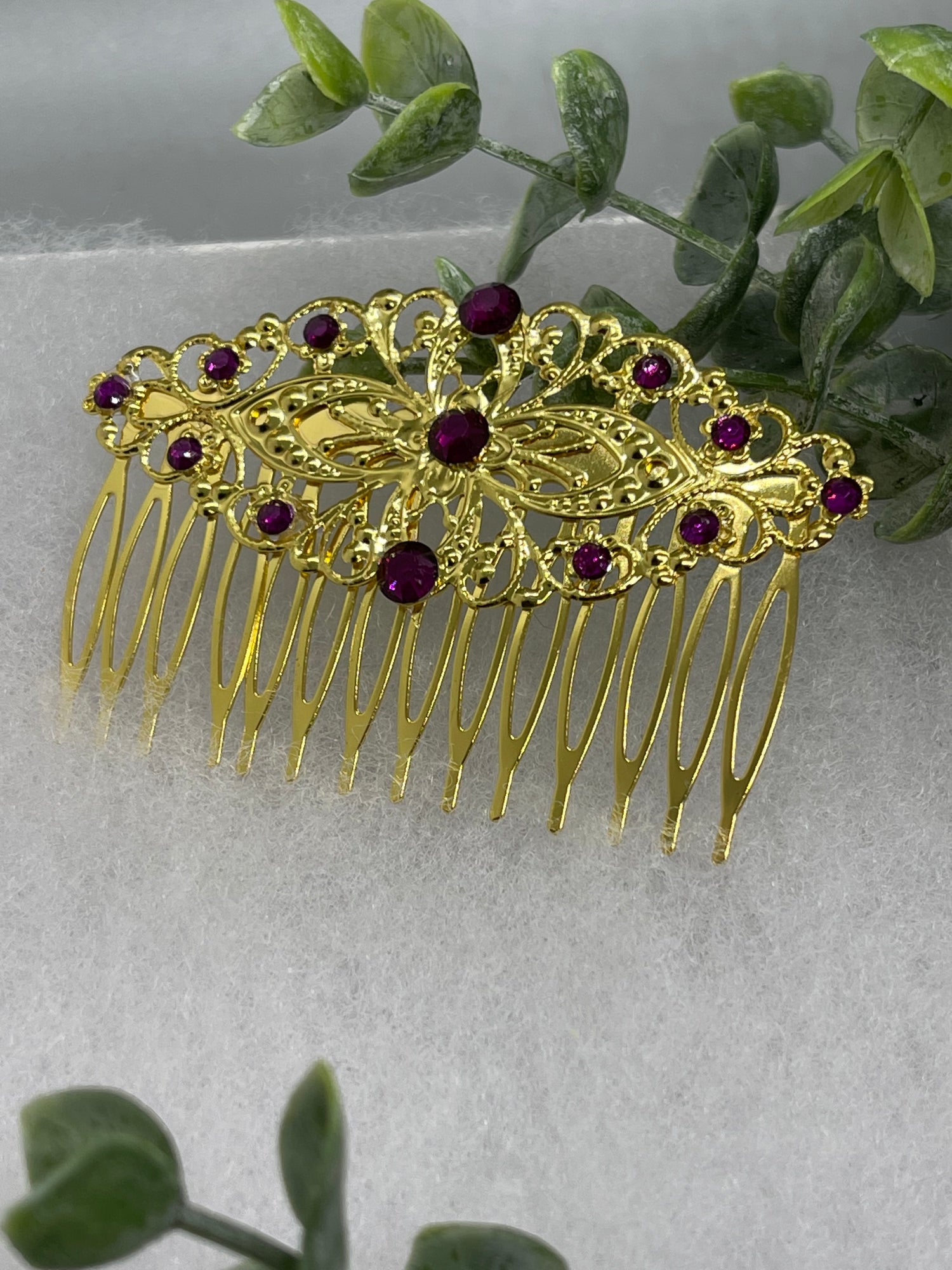 Purple crystal rhinestone 3.5” gold tone luxe side comb accessories. 