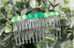 Green faux crystal side comb approximately 3.5” long plastic hair accessory bridal wedding Retro